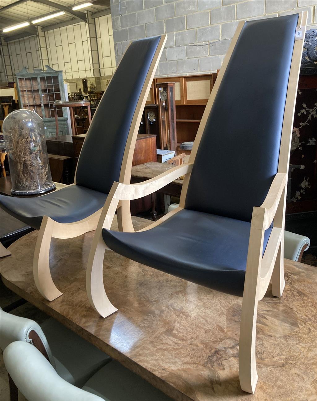 A pair of Bark furniture bespoke beech lounge chairs, one with arms. height 120cm, width 70cm, depth 90 cm